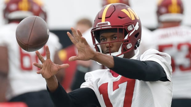 Commanders receiver Terry McLaurin catches a pass during practice.